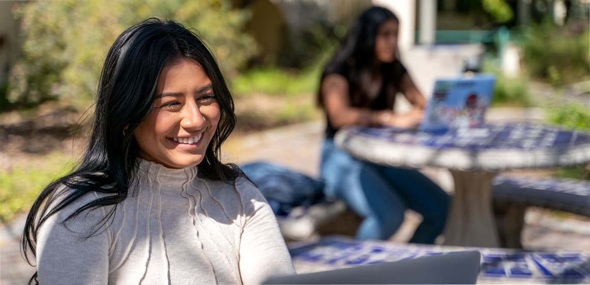 SDSU student studying outdoors